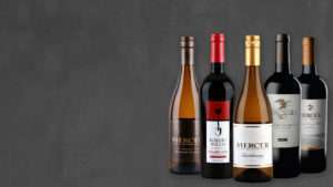 Old World vs New World wine displayed with their wine bottles